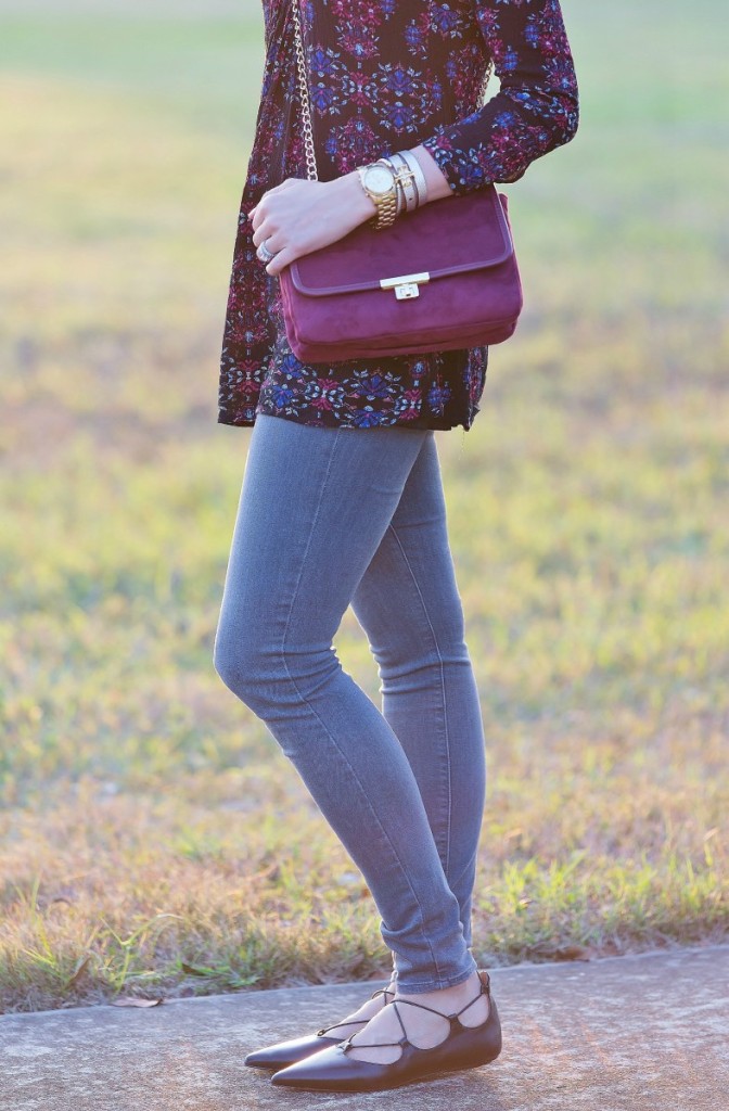 black tunic with merlot purse and lace up flats