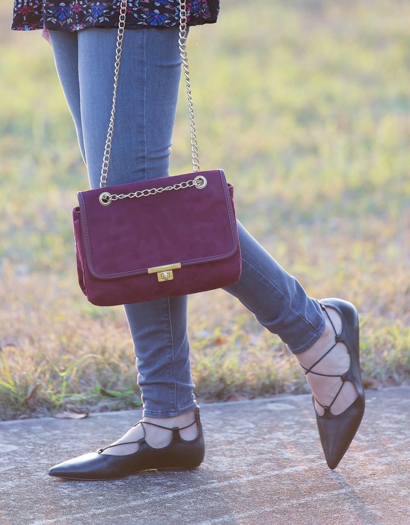 black tunic with merlot purse and lace up flats