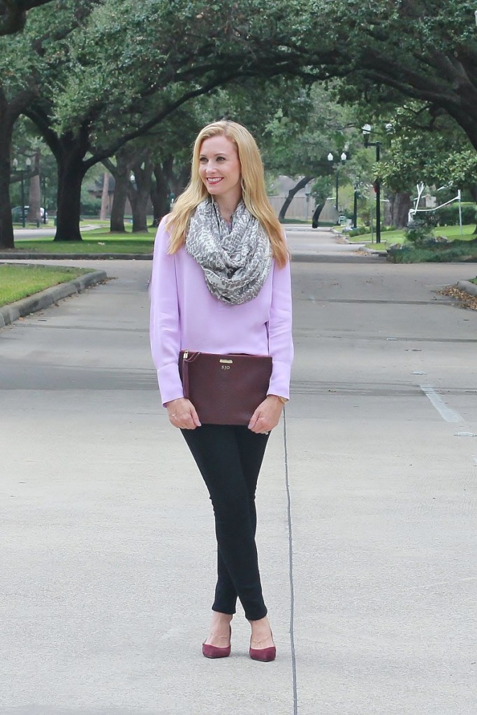 Purple shirt with black jeans and merlot accessories