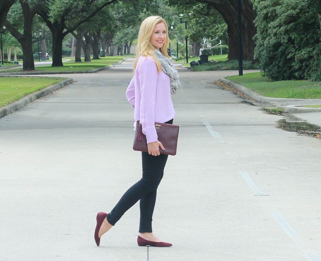 Purple shirt with black jeans and merlot accessories