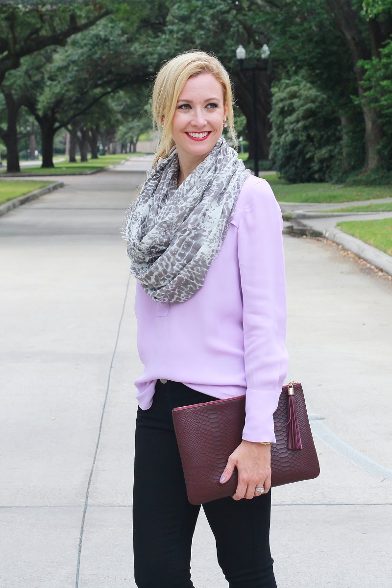 Purple shirt with black jeans and merlot accessories