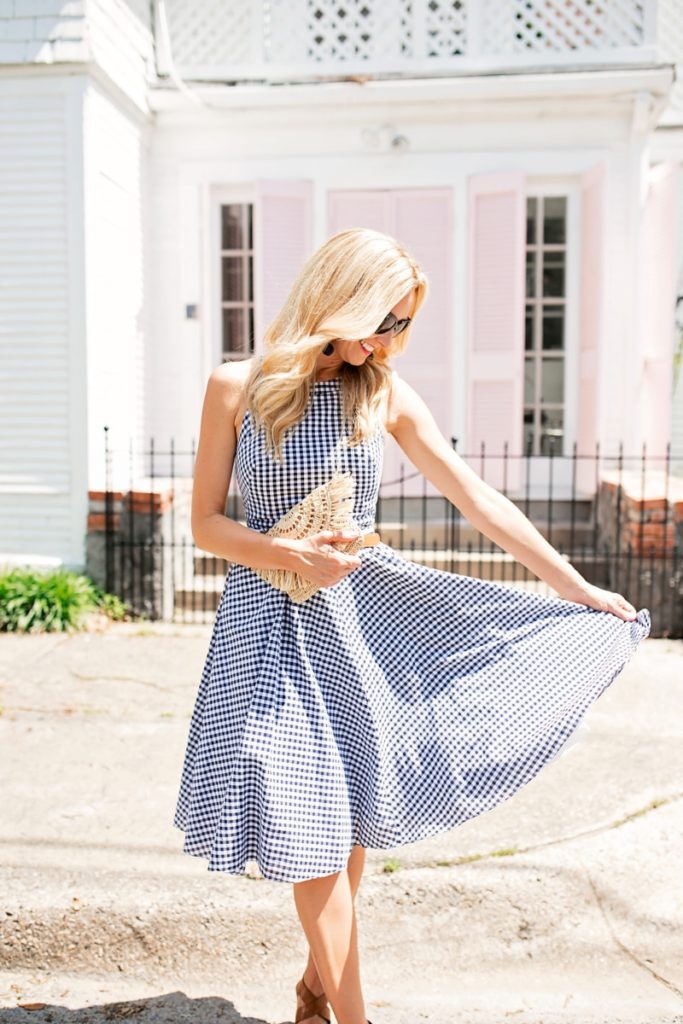 Perfect Gingham Dress with a Straw Clutch by fashion blogger Sara of Haute & Humid