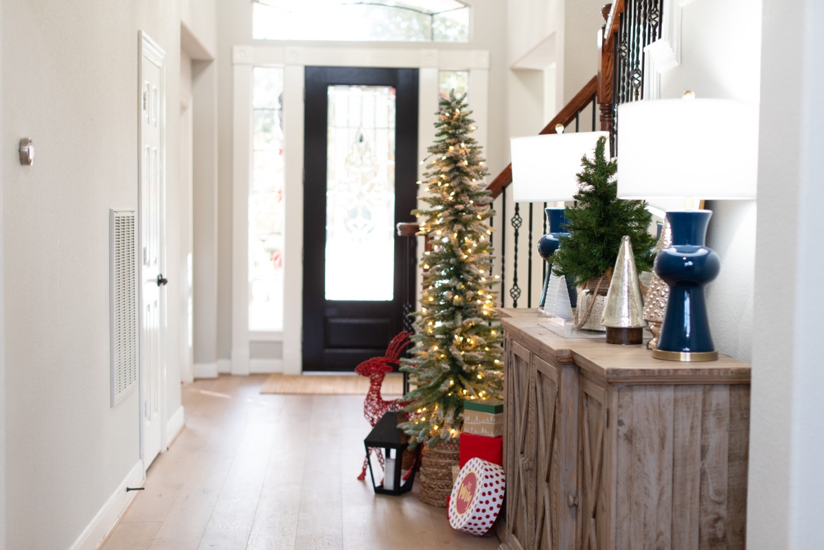 christmas entryway | Holiday Home Tour: Festive Christmas Home Decor featured by top Houston life and style blog Haute & Humid