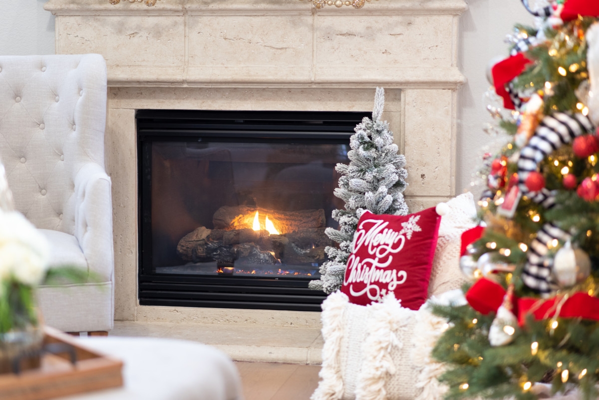 christmas fireplace | Holiday Home Tour: Festive Christmas Home Decor featured by top Houston life and style blog Haute & Humid
