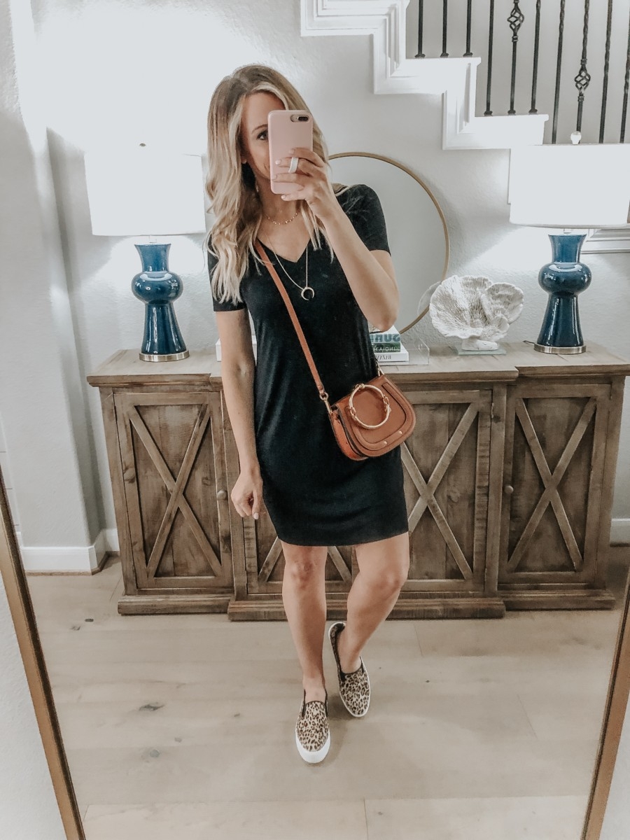 Amazon Favorites featured by top US fashion blog Haute & Humid; Image of a woman wearing Amazon Black Jersey Dress, Crescent Necklace- Gold layered necklaces and leopard sneakers.