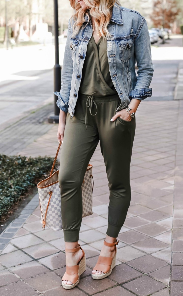 Spring Jumpsuit featured by top US fashion blog Haute & Humid; Image of a woman wearing Evereve jumpsuit, ABLE denim jacket and Treasure & Bond wedge sandals.