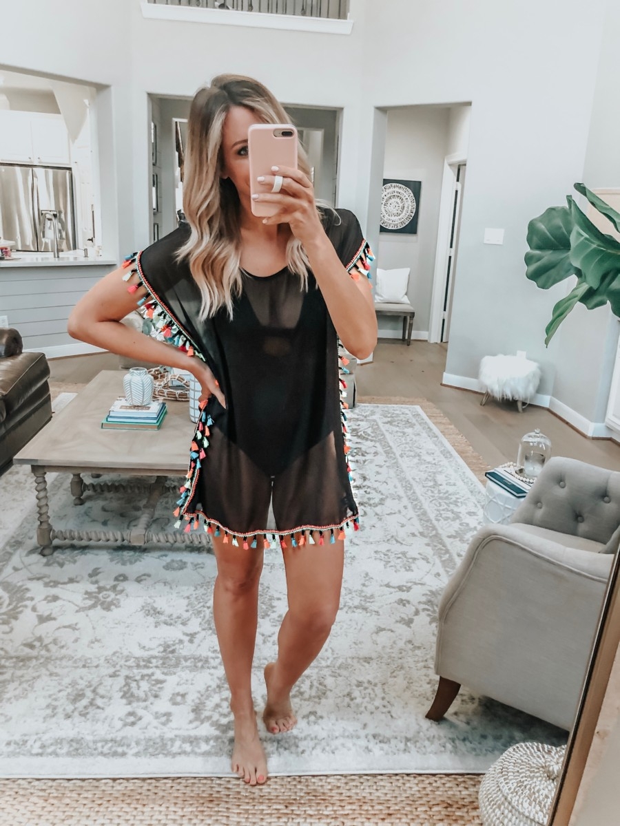 black swimsuit coverup | 8 Affordable Swimsuits For Summer featured by top US life and style blog, Haute & Humid; image of a woman wearing an Amazon cover up