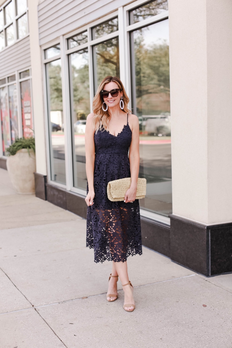 Spring Beauty featured by top US life and style blog Haute & Humid; Image of a woman wearing Nordstrom dress, Steve Madden sandals, Amazon clutch, Bauble Bar earrings and LE Specs sunglasses.