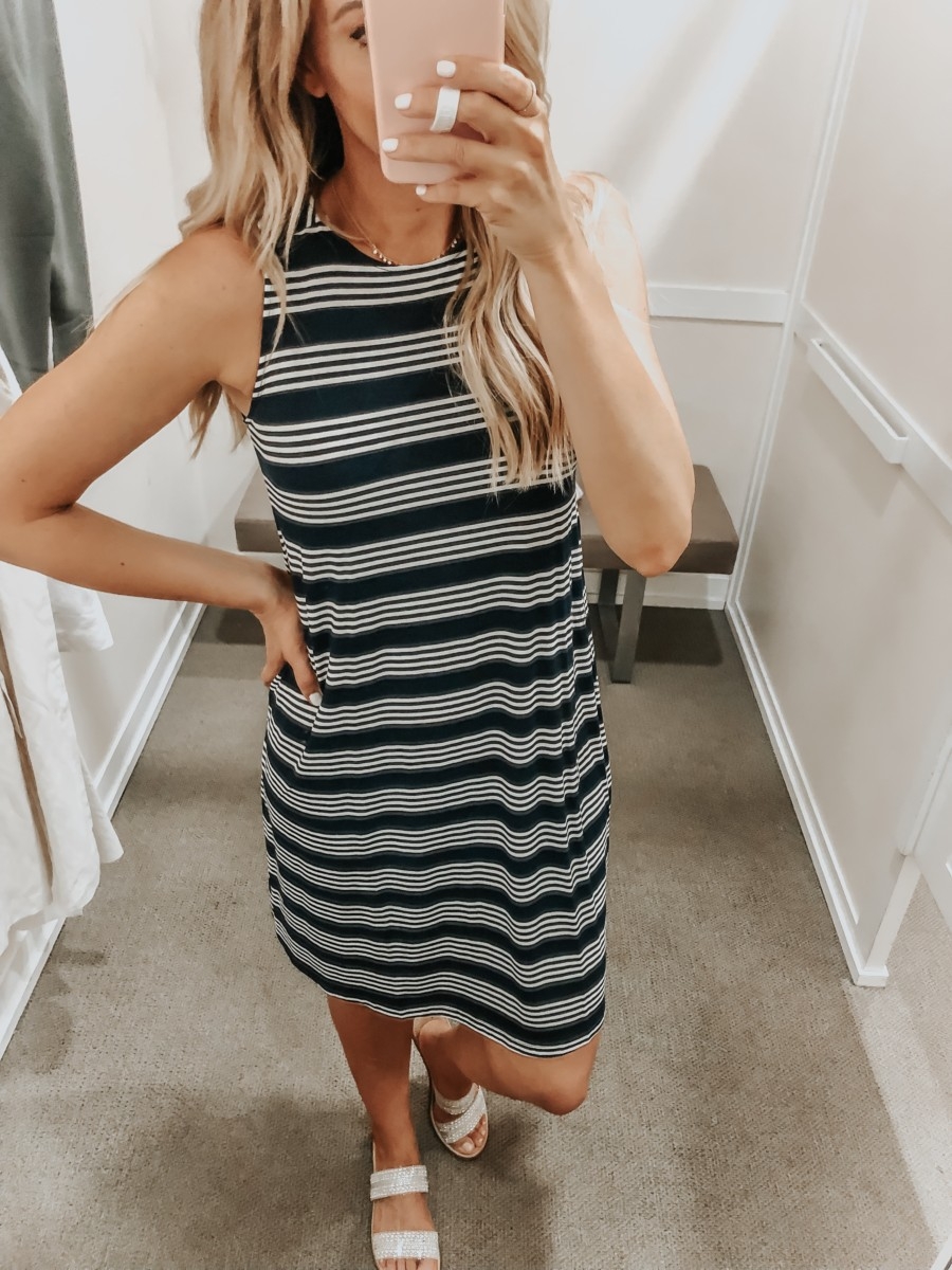 Best Memorial Day Weekend Sales featured by top US fashion blog Haute & Humid; Image of a woman wearing LOFT striped swing dress.