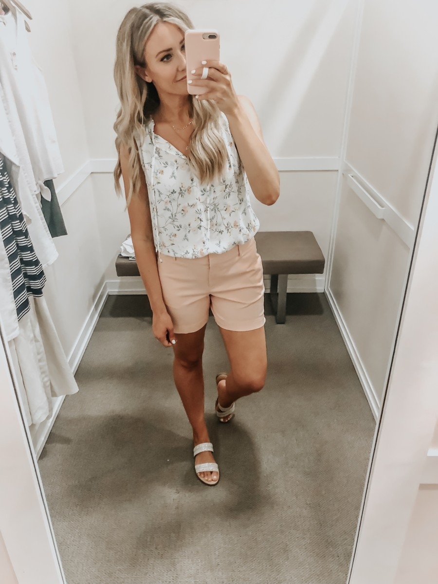 Best Memorial Day Weekend Sales featured by top US fashion blog Haute & Humid; Image of a woman wearing LOFT chino shorts and LOFT blouse.