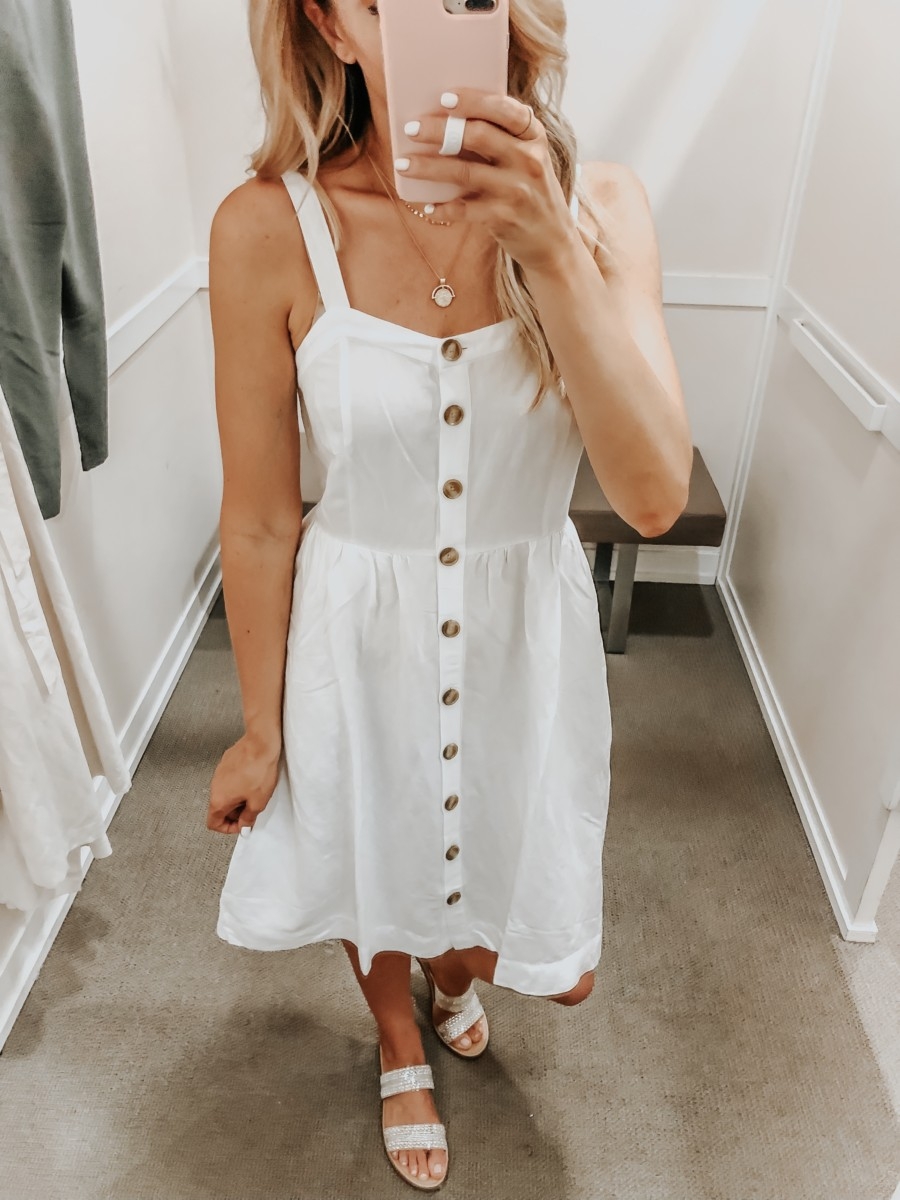 Best Memorial Day Weekend Sales featured by top US fashion blog Haute & Humid; Image of a woman wearing LOFT white dress.