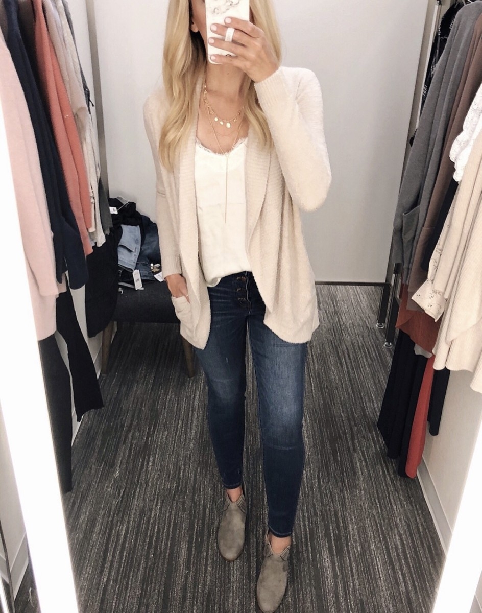 barefoot dreams cardigan | Nordstrom Anniversary Sale Favorites by popular Houston fashion blog, Haute and Humid: image of woman in a dressing room wearing Barefoot Dreams Circle Cardigan, Lace Trim Satin Camisole Top by BP, and 10-Inch High Waist Skinny Jeans: Button Front Edition MADEWELL. 
