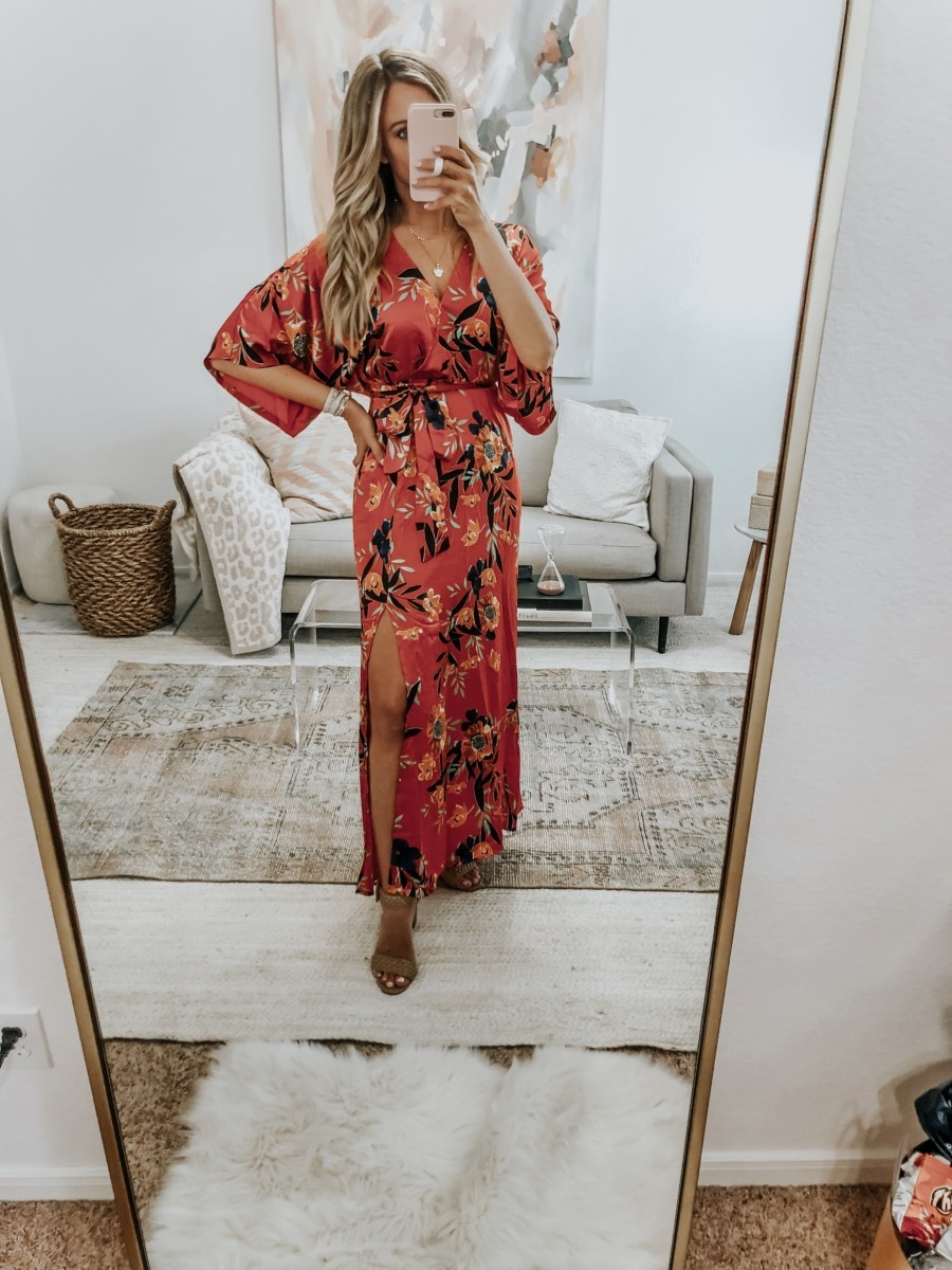fall wedding guest dress | 6 Early Fall Outfits With Vici by popular Houston fashion blog, Haute and Humid: image of a woman wearing a Vici Wildflower Satin Kimono Maxi Dress.