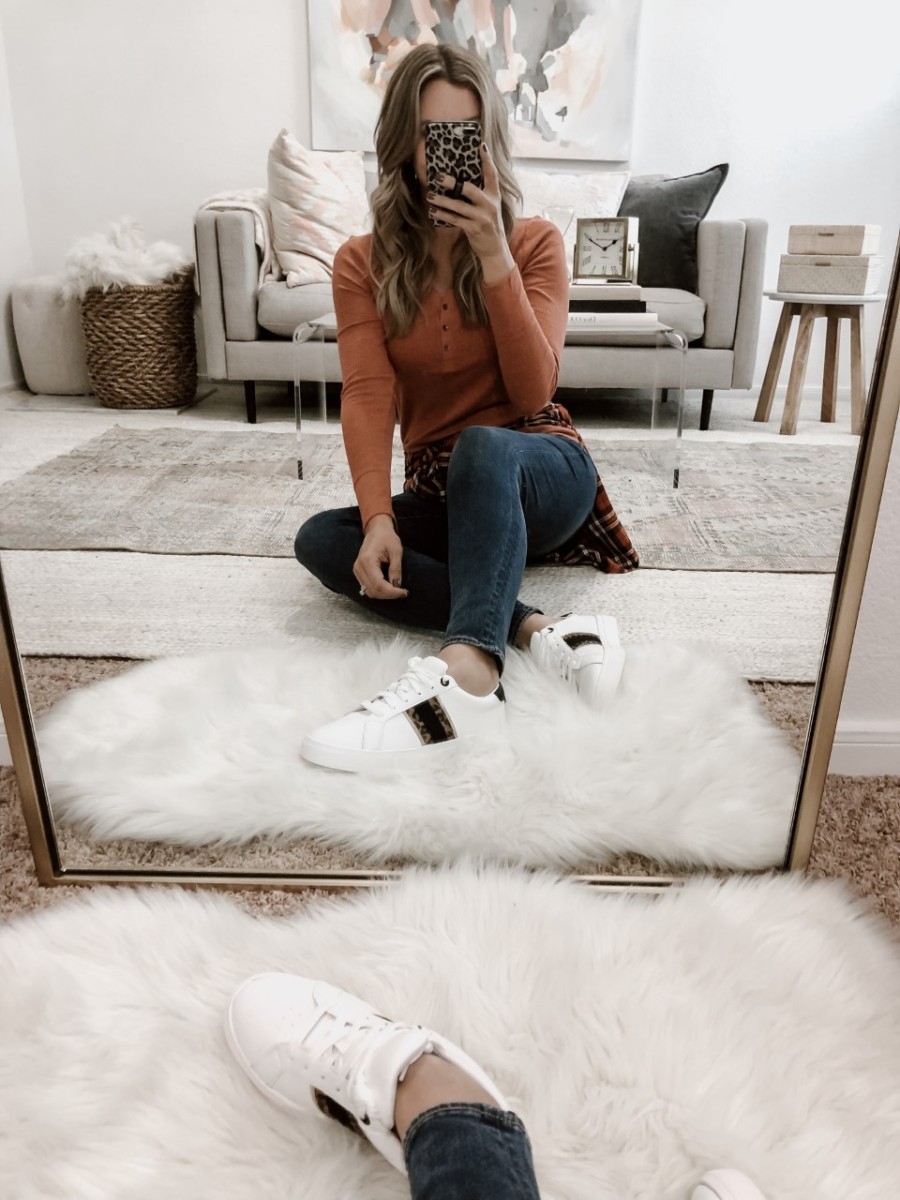 womens fashion sneakers | Must Have Affordable Fall Flats by popular Houston fashion blog, Haute and Humid: image of a woman wearing a Walmart Time and Tru Women's Thermal Henley T-Shirt, Walmart Time and Tru Womens Time and Tru Fashion Sneaker, and Walmart Time and Tru plaid shirt.