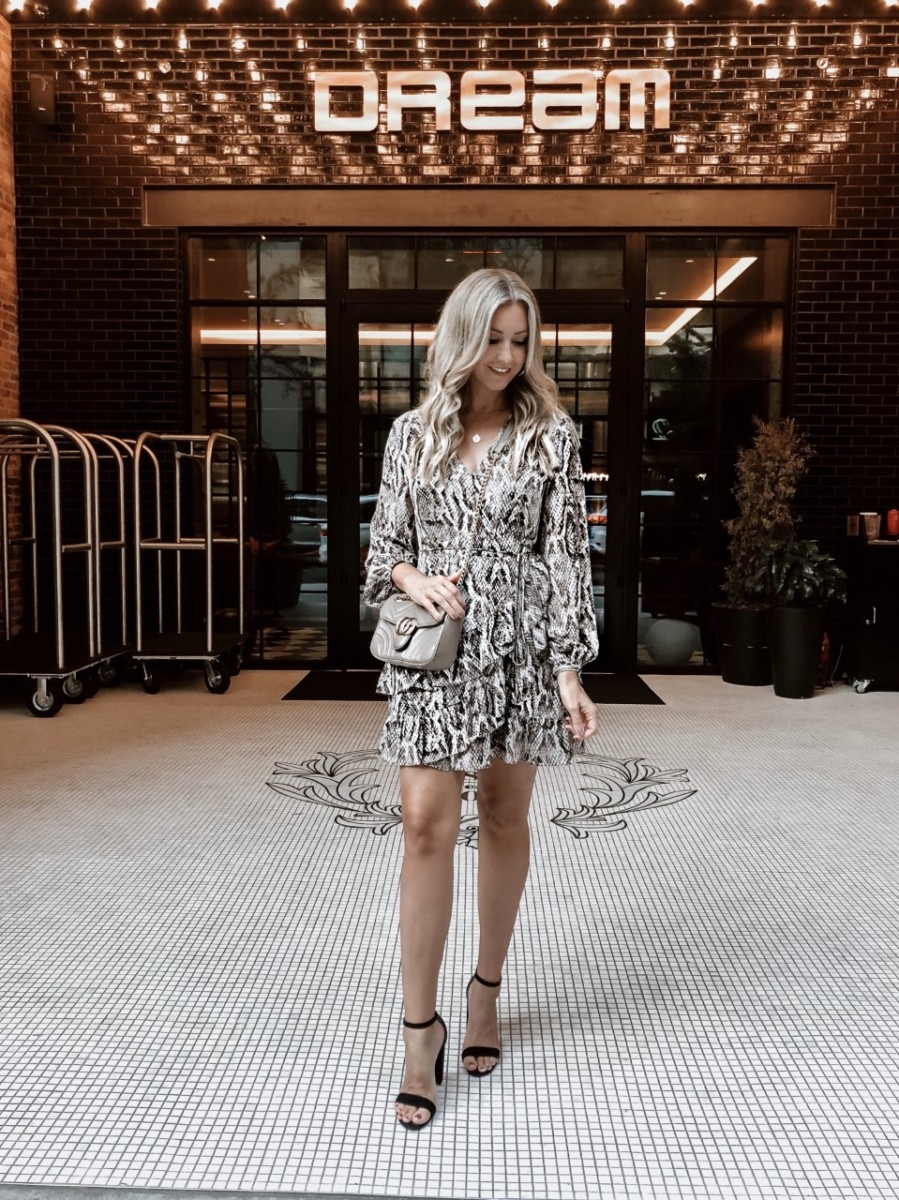 snake print dress | January Best Sellers by popular Houston life and style blog, Haute and Humid: image of a woman wearing a Nordstrom Sultry Snake Ruffled Long Sleeve Wrap Front Dress 1.STATE.