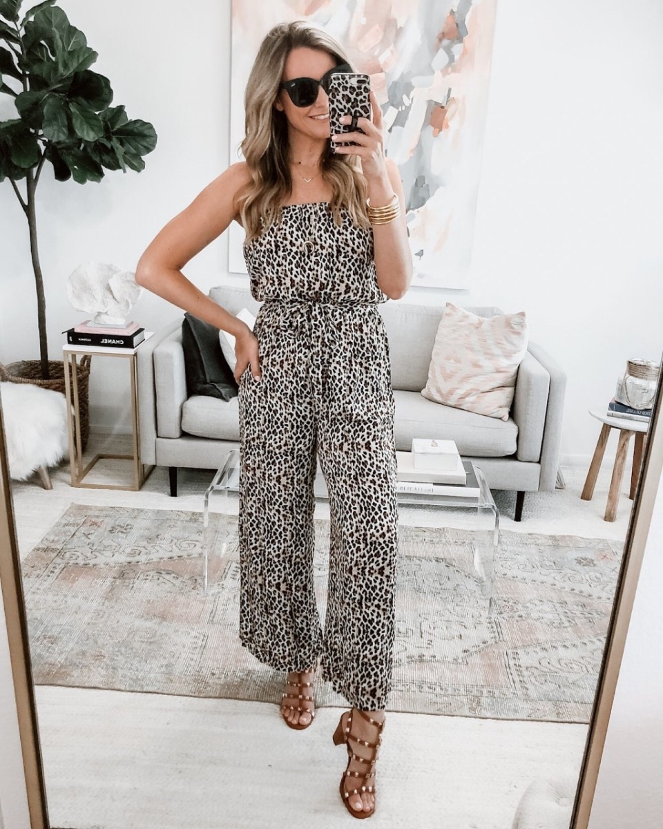 spring jumpsuit | Spring Clothing by popular Houston fashion blog, Haute and Humid: image of a woman wearing a strapless leopard print jumpsuit.
