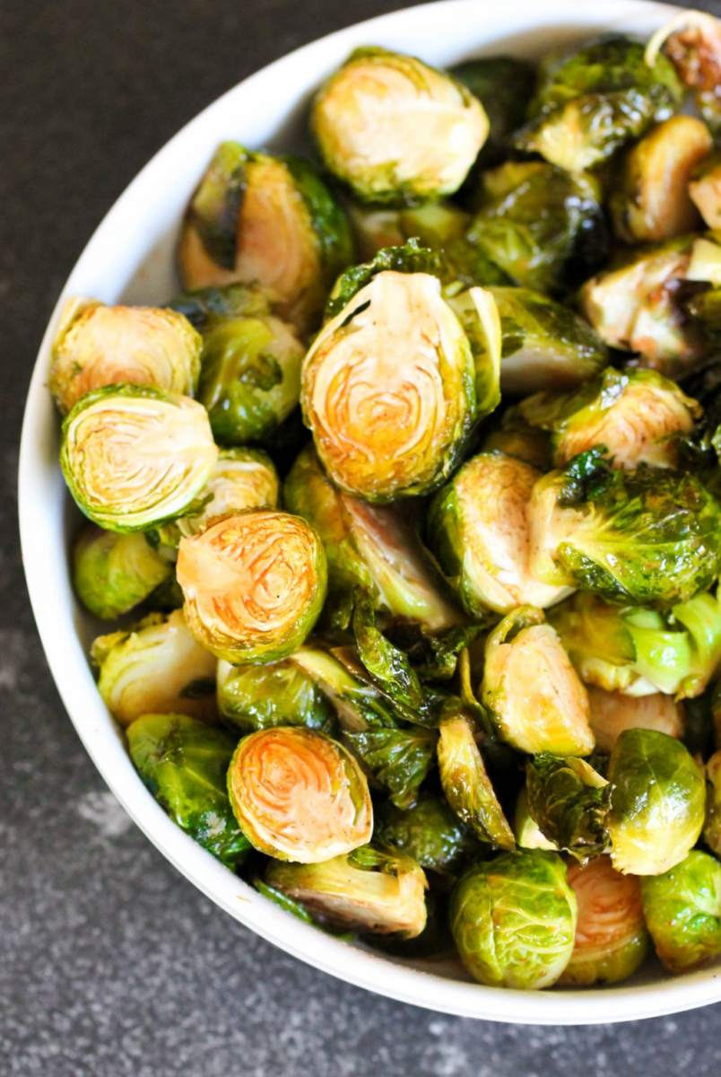 brussels sprouts | Stuck at Home Recipes by popular Houston lifestyle blog, Haute and Humid: image of honey siracha brussels sprouts. 