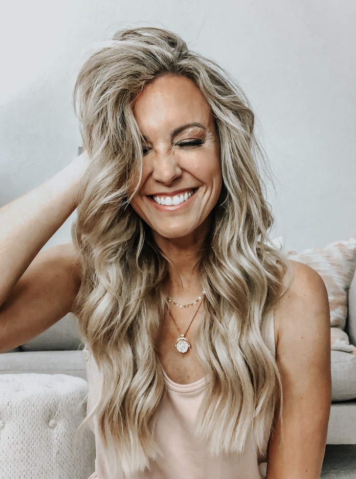 sephora vib sale | Sephora Spring Sale by popular Houston beauty blog, Haute and Humid: image of a woman with long blonde hair curled in beach waves. 