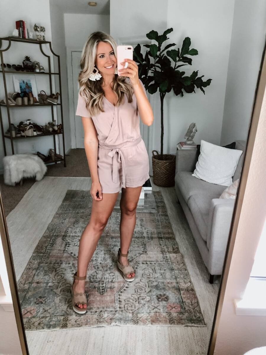 pink romper | Amazon Spring Try On by popular Houston fashion blog, Cute and Little: image of a woman wearing a Amazon Daily Ritual Women's Tencel Short-Sleeve Wrap Romper, Amazon WFYOU Rattan Tassel Earrings, and DSW DUNJA WEDGE SANDAL.