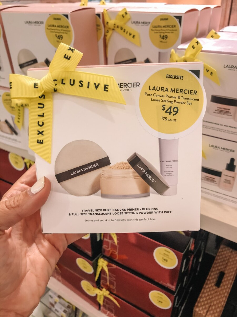 laura mercier powder | Nordstrom Anniversary Sale by popular Houston beauty blog, Haute and Humid: image of a woman holding Laura Mercier powder. 