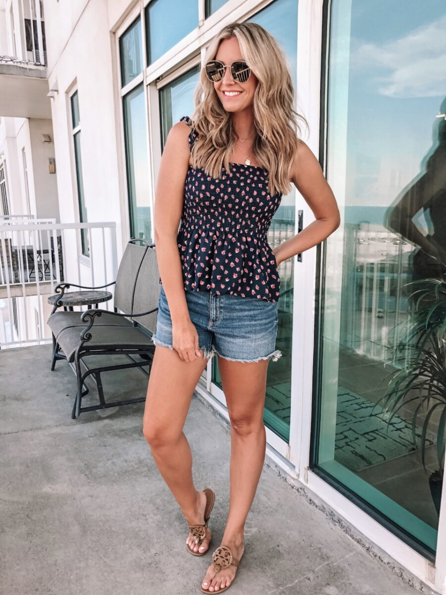 amazon fashion | Best Amazon Products by popular Houston life and style blog: image of a woman wearing a Amazon peplum top with denim shorts. 