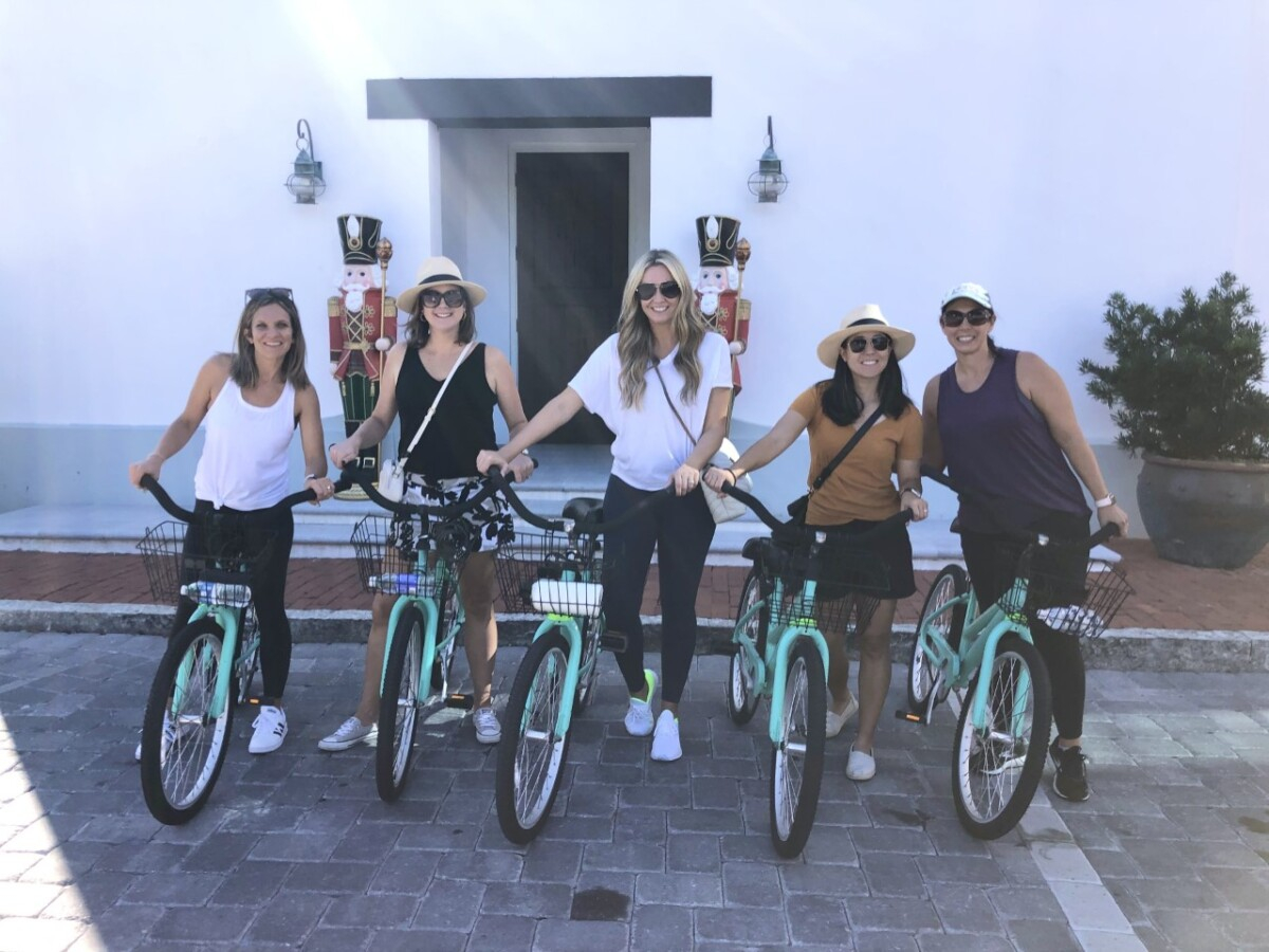 30a bike rental |Florida Beach House Rental by popular Houston travel blog, Haute and Humid: image of four women riding beach cruiser bikes. 