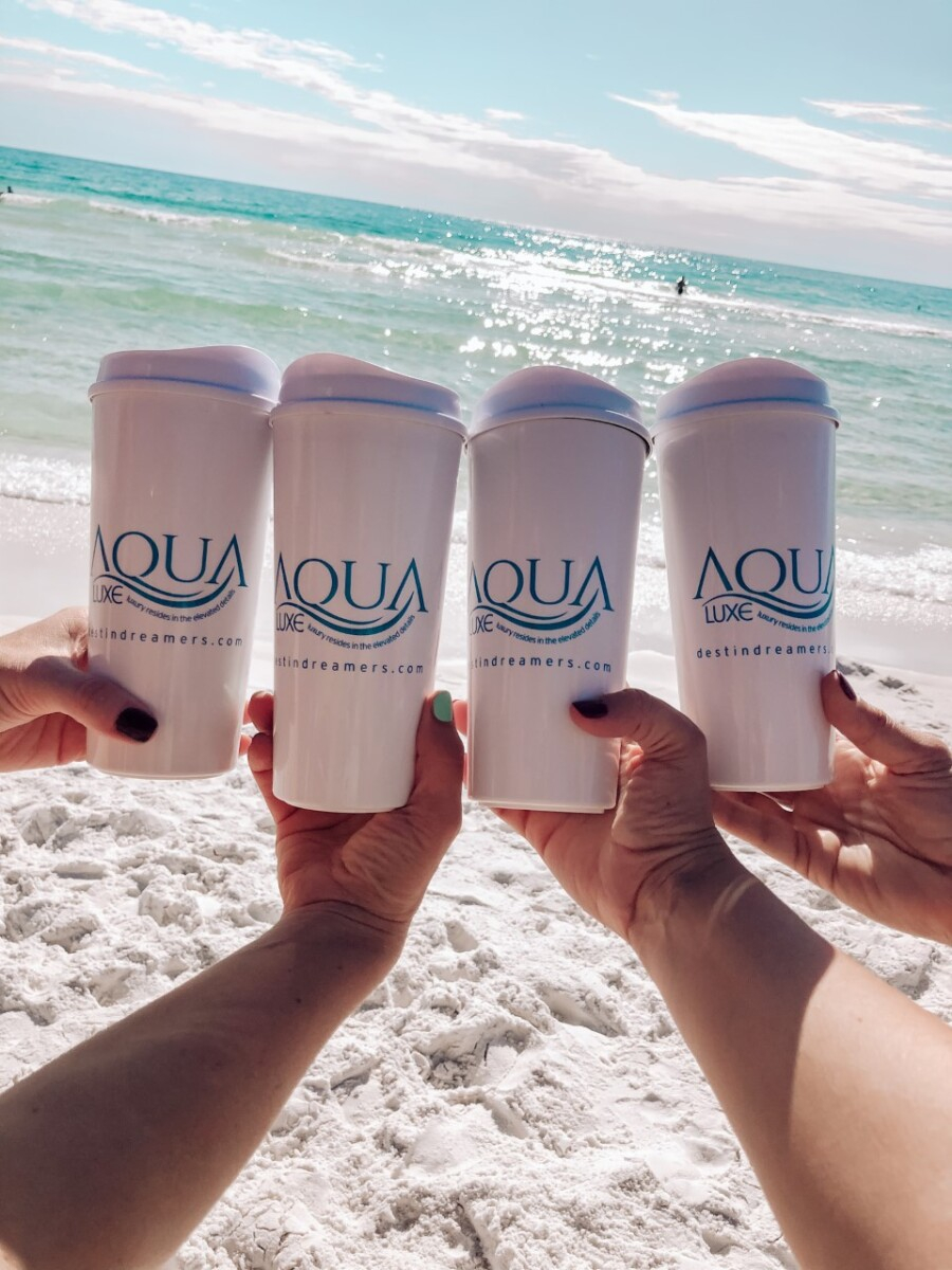 30a beach rentals |Florida Beach House Rental by popular Houston travel blog, Haute and Humid: image of four women holding Aqua Luxe cups. 