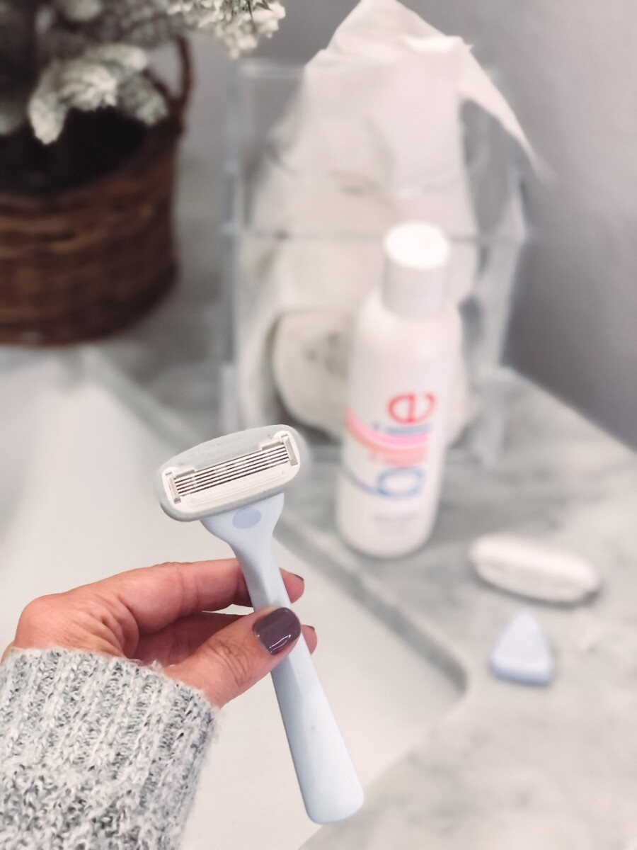 razor for women |Billie Razor by popular Houston beauty blog, Haute and Humid: image of a woman sitting on the edge of her tub and holding a Billie Razor. 