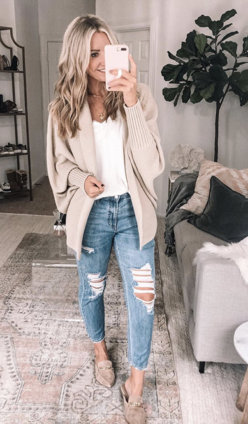 amazon cardigan |Amazon Bestsellers by popular Houston life and style blog, Haute and Humid: image of a woman wearing a cream cardigan, white cami, and distressed jeans. 