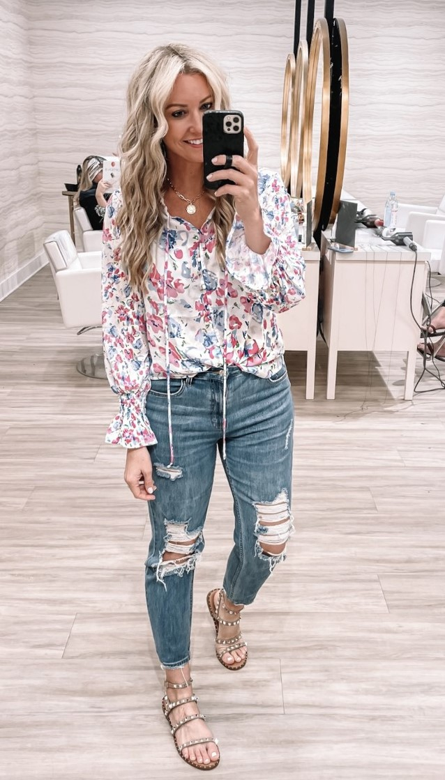 amazon spring tops |Amazon Favorites by Houston life and style blog, Haute and Humid: image of a woman wearing a Amazon floral top with a pair of distressed denim. 