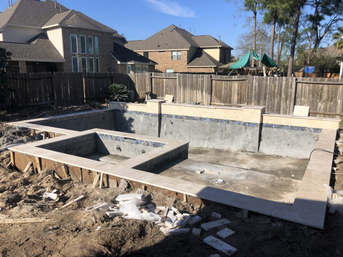 Pool and Outdoor Kitchen Design | pool dig | pool before and after | Outdoor Kitchen by popular Houston life and style blog, Haute and Humid: image of people building a pool in the backyard. 