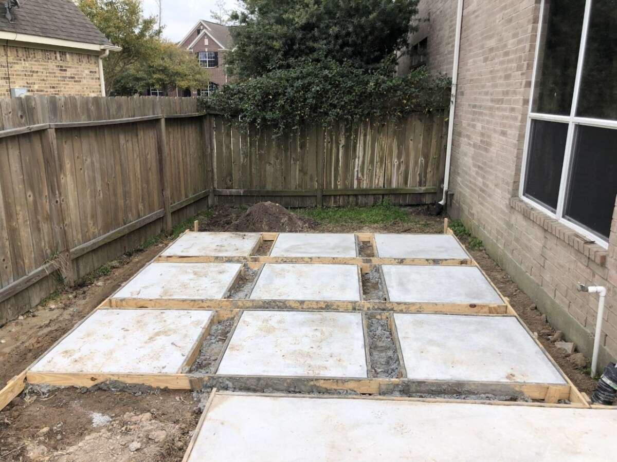 pool design | pool dig | pool before and after | Outdoor Kitchen by popular Houston life and style blog, Haute and Humid: image of spaced cement square slabs. 