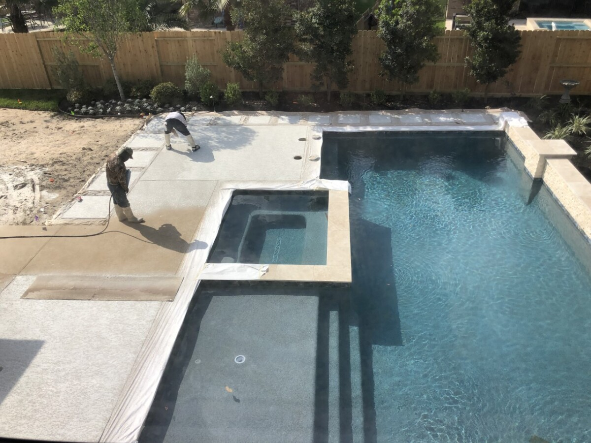 pool dig | pool before and after | Outdoor Kitchen by popular Houston life and style blog, Haute and Humid: image of a pool getting filled with water. 